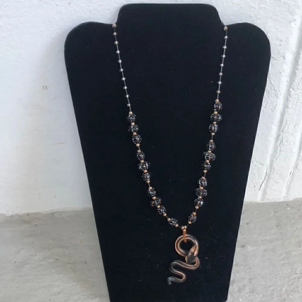 Glass necklace.